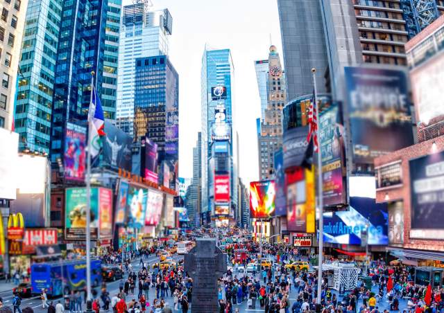 Buildings, people and billboards in Times Square
