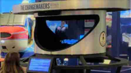 A woman reads a display at an exhibit on women's history at the RMSC Museum & Science Center