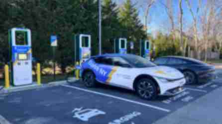 Cars parked in front of EVolve NY fast charging stations