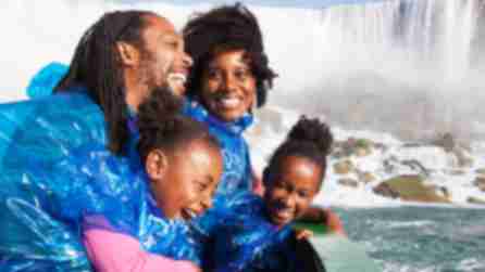 family of four on maid of the mist boat tour
