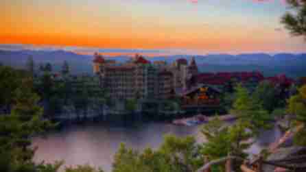 Stunning orange sunset over Mohonk Mountain House on a relaxing weekend getaway in the Hudson Valley, NY