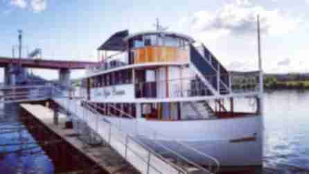 The exterior of the Dutch Apple Cruises boat on the water